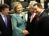 Встреча непримиримых - Чавес и Клинтон пожали друг другу руки и мирно побеседовали