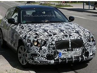 Шпионы "поймали" закамуфлированный BMW 1 серии 2011 года