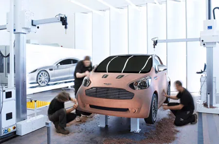 Миникар Toyota iQ будет продаваться под брендом Aston Martin